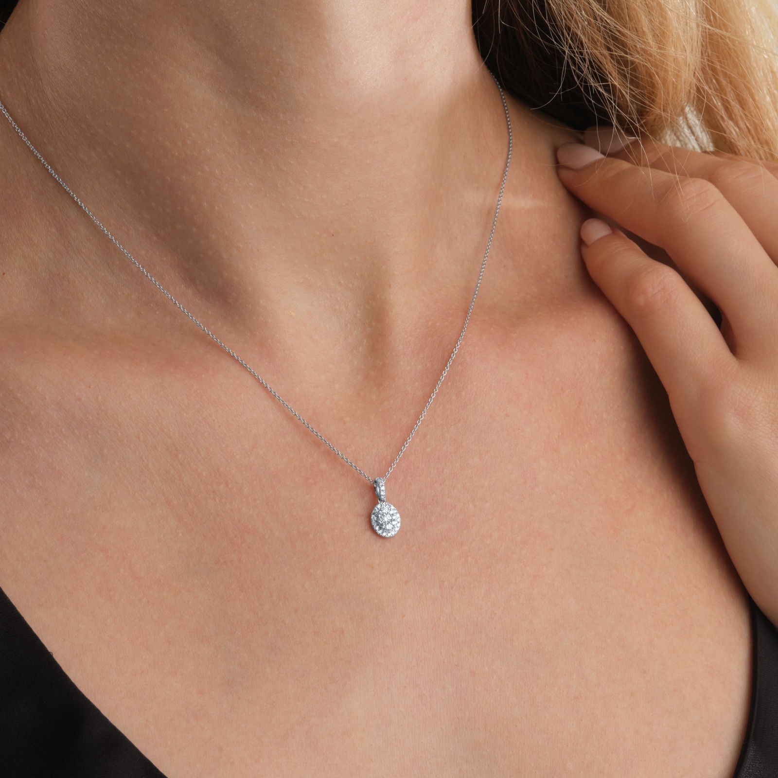 Goldsmiths 9ct White Gold 0.20cttw Oval Shape Diamond Cluster Pendant