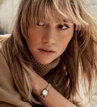 Lady wearing Michael Kors watch  image